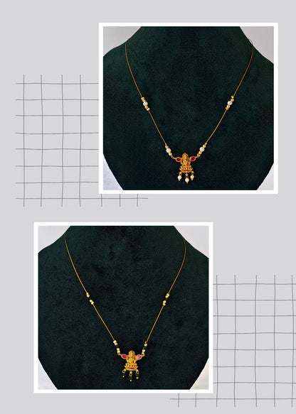 A gold-toned necklace with a small decorative pendant shown in two inset views on a light gray background with a subtle grid pattern.