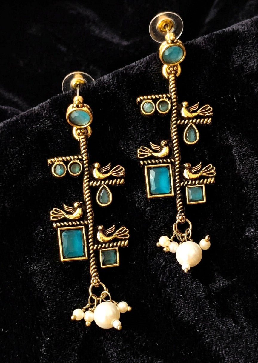 Gold toned oxidized earring with bird motif and aqua blue stone accents 