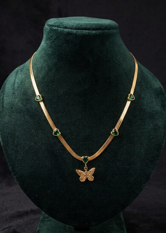 Anti tarnish golden necklace with butterfly pendant and emerald green heart stones.