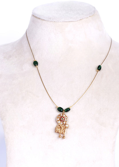 Avani fine-wire necklace with green beads and a floral mandala and elephant pendant on a white display.