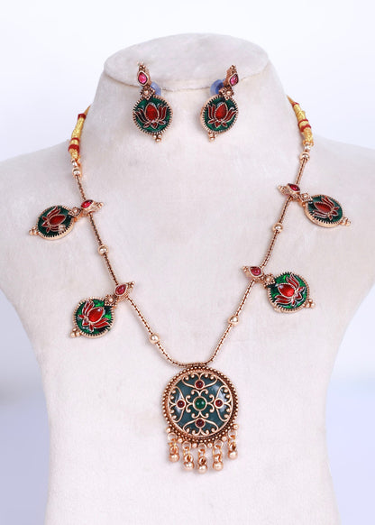Antique style necklace set with green enamel pendant and red lotus engraved in green enamel accents. Pairing earring of the same accent