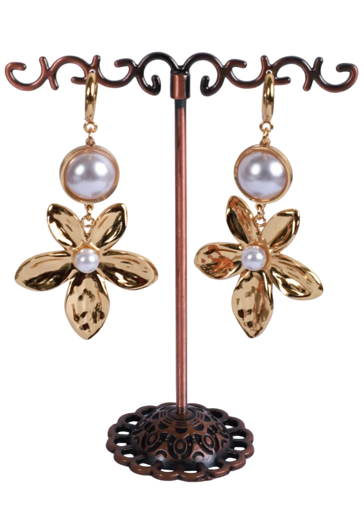A pair of gold-tone flower drop earrings with white pearl accents.